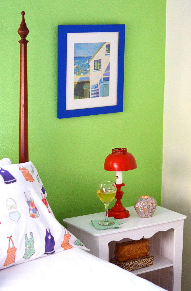 Our summery beach bedroom makeover, complete with a glass of wine