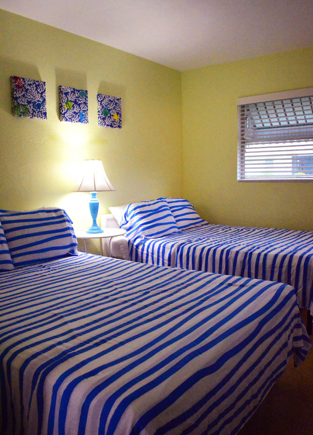Bright and fun decor in the bedroom at the Palm Court Motel in Dunedin Florida