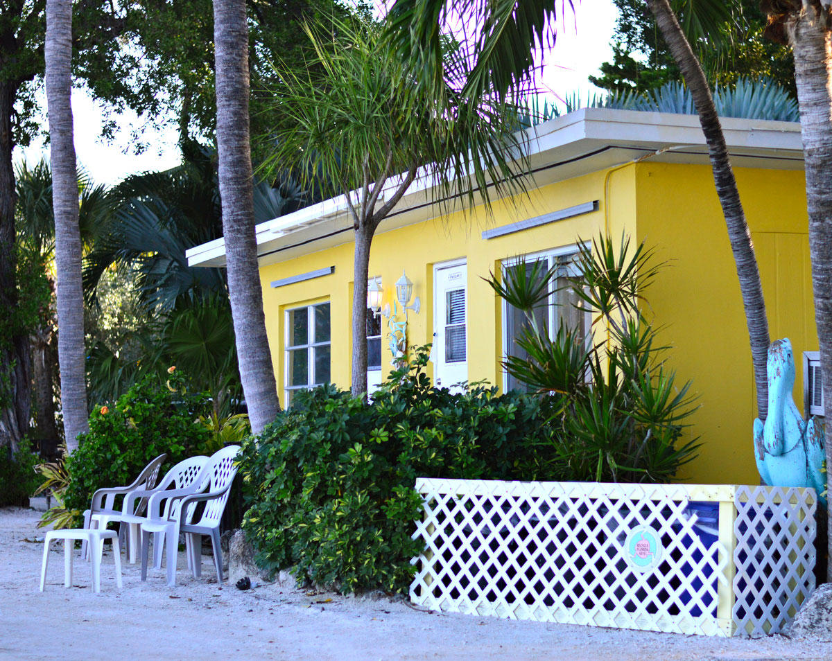 Yellow waterfront cottage Sunset Cove Beach Resort Key Largo