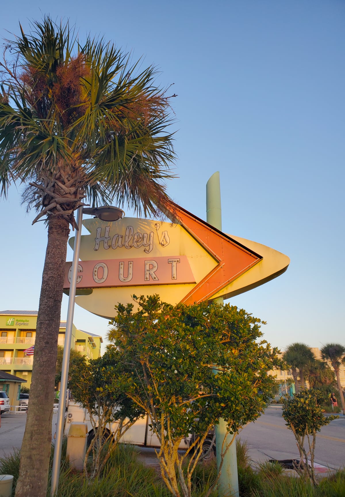 Vintage Haley's Court sign with new Holiday Inn Express in the background Vilano Beach