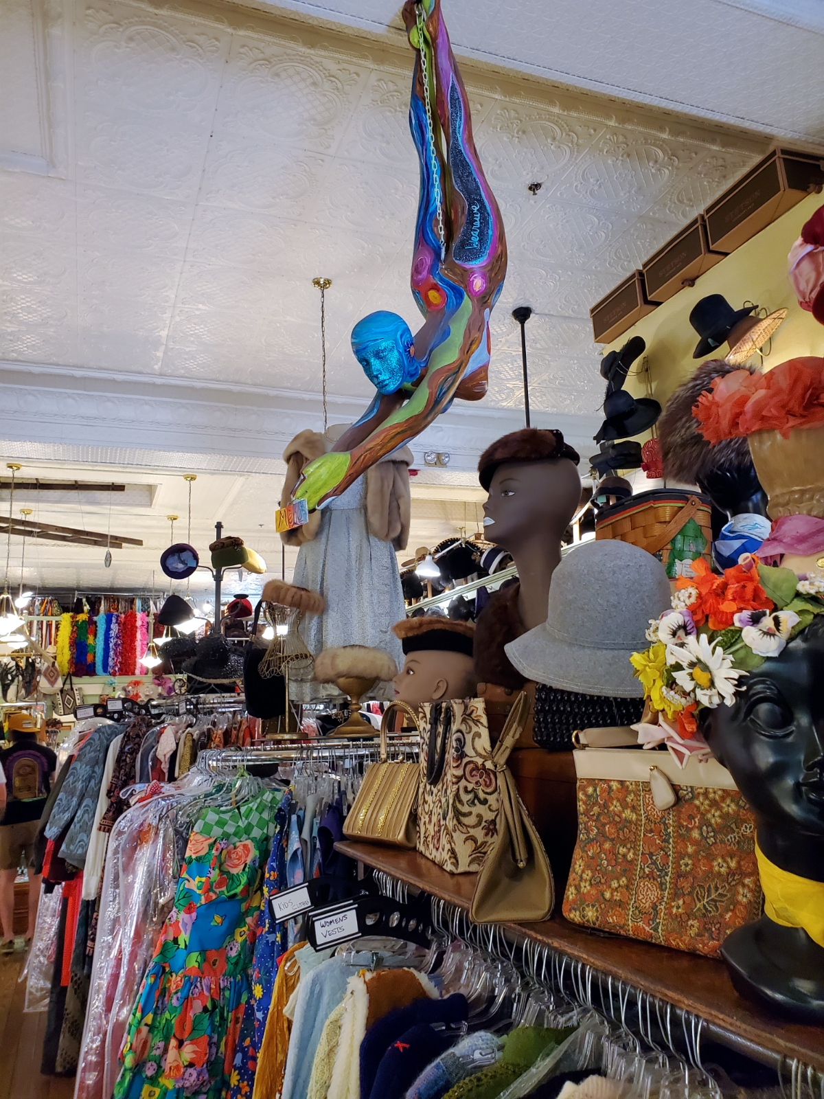 Ybor City La France vintage shop diving mannequin painted in psychedelic patterns and colors