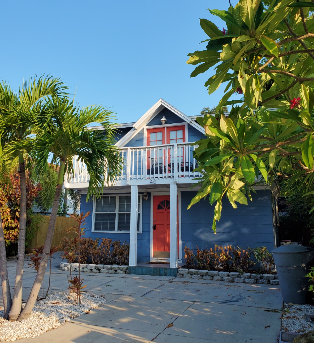 Gray cottage with orange trim Sunset Beach FL